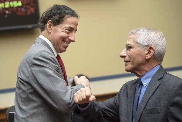 Dr. Anthony Fauci, Director of the NIH National Institute of Allergy and Infectious Diseases, greets Rep. Jamie Raskin, D-MD, with an elbow bump to avoid shaking hands before Fauci testified during a House Oversight Committee Hearing on Coronavirus preparedness and response on Capitol Hill in Washington, D.C. on March 11, 2020.  WAP20200311306 KEVINxDIETSCH