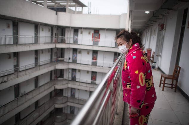 (200312) -- WUHAN, March 12, 2020 -- A cured coronavirus patient who has finished a 14-day quarantine for medical observation awaits before leaving a rehabilitation center in Wuhan, central China s Hubei Province, March 12, 2020. A total of 85 cured coronavirus patients who were discharged from hospital finished their 14-day quarantine for medical observation on Thursday at the rehabilitation center based in Wuhan Vocational College of Software and Engineering. They would be sent directly to their communities and return home accompanied by community staff. Wuhan, the epicenter of the novel coronavirus outbreak, requires COVID-19 patients cured and discharged from hospital to go on a 14-day quarantine at designated places for medical observation. ) CHINA-HUBEI-WUHAN-COVID-19-CURED PATIENTS-MEDICAL OBSERVATION-END (CN) XiaoxYijiu 