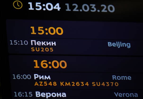 MOSCOW REGION, RUSSIA - MARCH 12, 2020: An arrivals information board showing flights from China and Italy at Terminal F at the Sheremetyevo International Airport outside Moscow. The airport has enhanced security screening of arriving passengers for the novel coronavirus (Covid-19). Russia s has suspended most flights from China, Iran, and South Korea with the remaining flights transferred to Terminal F at the Sheremetyevo International Airport. On 13 March, Russia is to introduce the same security measures in relation to flights from Italy, Germany, France and Spain. All the passengers arriving at the airport s Terminal F must fill in a form and have their temperature measured. As of 12 March 2020, Russia has confirmed 28 cases of the novel coronavirus, with 16 cases in Moscow. Sergei Bobylev TASS  TS0D1C86