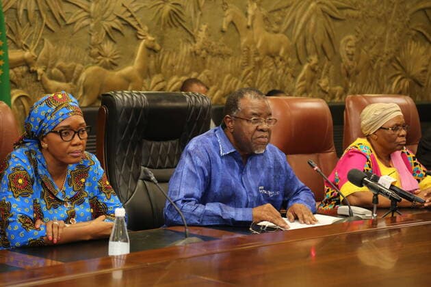 (200314) -- WINDHOEK, March 14, 2020 (Xinhua) -- Namibian President Hage Geingob (C) speaks to the media in Windhoek, Namibia, March 14, 2020. Namibia on Saturday cancelled independence celebrations slated for March 21 following a confirmation of COVID-19 cases in the country on Saturday. Namibian President Hage Geingob announced that the country has suspended in and outbound travel from Ethiopia, German and Qatar with immediate effect. (Photo by Harris Rodgers Xinhua) NAMIBIA-WINDHOEK-CORONAVIRUS-INDEPENDENCE CELEBRATIONS-CANCELLATION 