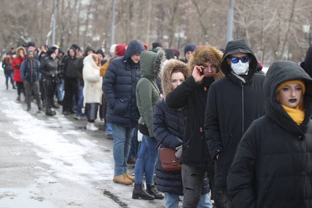 MOSCOW, RUSSIA - MARCH 15, 2020: Fans outside VTB-Arena ahead of a concert by the German-Swedish industrial metal duo Lindemann. The Lindemann duo created by Rammstein vocalist Till Lindemann and Swedish musician Peter Tagtgren, is to give a day and a night concert at the stadium following Moscow Mayor Sergei Sobyanin s decree banning public events with over 5 thousand participants in Moscow due to the coronavirus threat till April 10, 2020. Vyacheslav Prokofyev TASS  TS0D228B