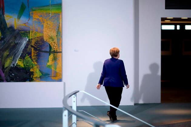 Angela Merkel - Statement Coronavirus DEU, Deutschland, Germany, Berlin, 13.03.2020 Bundeskanzlerin Angela Merkel geht nach dem Statement vor dem Gespraech mit den Spitzenverbaenden der deutschen Wirtschaft und den Gewerkschaften zu den wirtschaftlichen Folgen der Ausbreitung vom Coronavirus in der Skylobby im Bundeskanzleramt in Berlin. German Chancellor Angela Merkel, during a statement to the media at the Chancellery Office before her meeting with the heads of Germans Economy organisations and unions at the Skylobby in Berlin. The conversation with the representatives of German business associations and the trade unions is taking place as the government prepares further measures to buffer the economy against the effects of the coronavirus epidemic. The number of confirmed cases in Germany has a heavy impact on public life