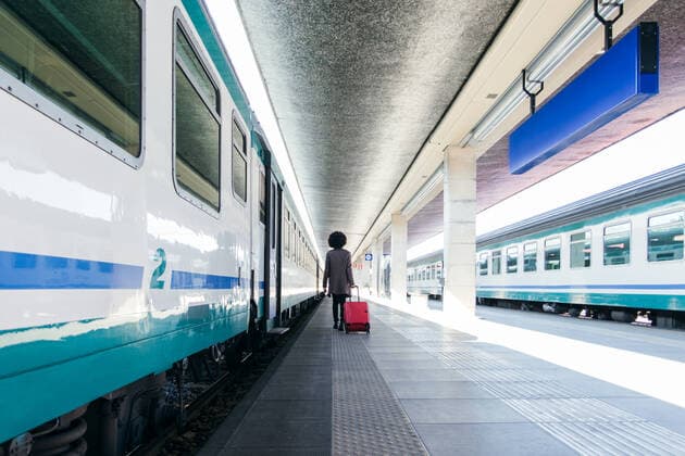 Tourist woman going for vacation trip on train Venice, Veneto, Italy ,model released, Symbolfoto CR_ANPR200207-230895-01