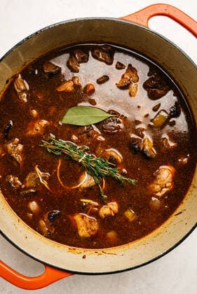 Hearty beef stew with herbs in a Dutch oven Frederick, MD, United States CR_EEAV200212A-311382-01