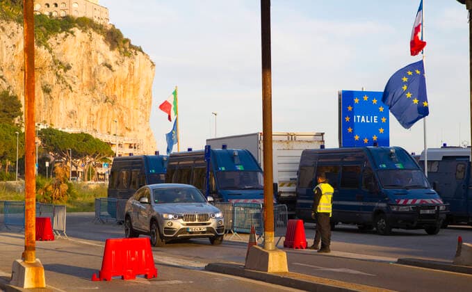 Menton, France - March 16, 2020: Coronavirus Disease 2019 (COVID-19) in France Italie: Road checks are set up at the French-Italian border at the Saint Ludovic Post pass, near Menton. Corona, Virus, COVID19, SARS-CoV-2, Pandemie, SARS, Grenzkontrollen, Polizei, Police, Gendarmerie Coronavirus Disease 2019 (COVID-19) in France Italie