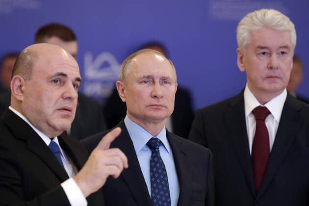 MOSCOW, RUSSIA - MARCH 17, 2020: Russia s Prime Minister Mikhail Mishustin, President Vladimir Putin and Moscow Mayor Sergei Sobyanin (L) visit the Moscow coronavirus crisis centre. Mikhail Metzel TASS  TS0D2694