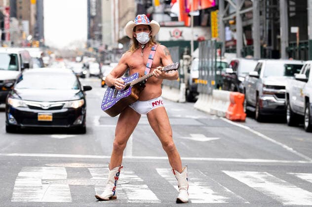 March 17, 2020, New York, NY, U.S: March 17, 2020 - New York, NY, United States: The NAKED COWBOY performing and wearing a face mask in Times Square in New York City. New York U.S. - ZUMAb161 20200317_zap_b161_032 Copyright: xMichaelxBrochsteinx