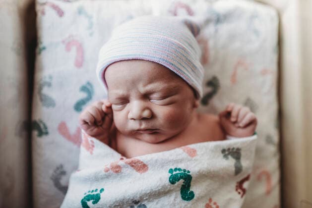 Creative Highlights Symbolfotos Overhead view of newborn boy with hat swaddled in hospital bassinet San Diego, CA, United States ,model released, Symbolfoto CR_KESM200220-260948-01