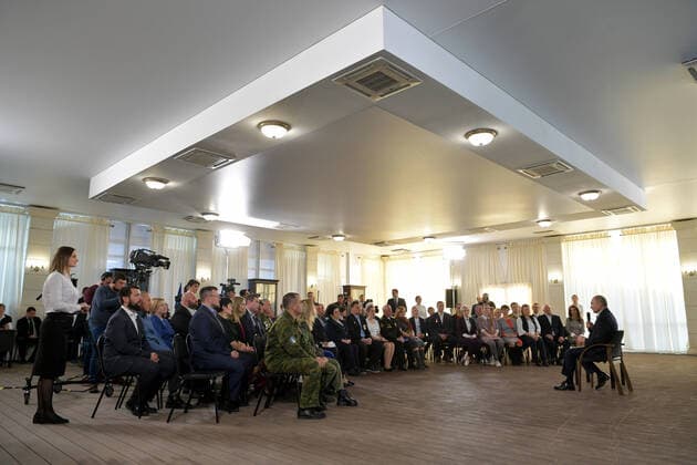 SEVASTOPOL, RUSSIA - MARCH 18, 2020: Russia s President Vladimir Putin (R front) holds a public meeting at the Konstantinovskaya Batareya Konstantin Battery Museum and Exhibition Centre. Alexei Druzhinin Russian Presidential Press and Information Office TASS  TS0D2A48