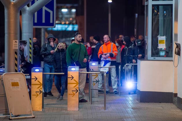 Employees of Czech car-maker Skoda Auto leave Skoda Auto s plant in Mlada Boleslav, Czech Republic, after shutdown of the plant in relation to coronavirus outbreak, on March 18, 2020. (CTKxPhoto RadekxPetrasek) CTKPhotoP202003181241401 PER 18K