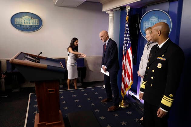 March 19, 2020, Washington, District of Columbia, USA: Katie Waldman, Mike Pence s Press Secretary, asks Stephen Hahn, Commissioner, United States Food and Drug Administration (FDA) to move before US President Donald Trump s briefing on the Coronavirus COVID-19 pandemic at the White House in Washington on March 19, 2020. Looking on at right are Dr. Deborah L. Birx, White House Coronavirus Response Coordinator and US Surgeon General Vice Admiral (VADM) Jerome M. Adams, M.D., M.P.H. Washington USA - ZUMAs152 20200319_zaa_s152_046 Copyright: xYurixGripasx