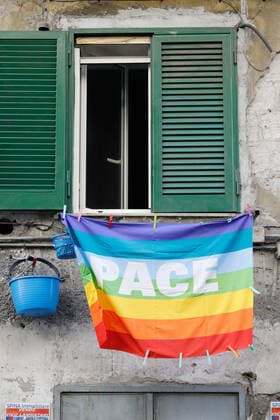 March 20, 2020, Naples, CAMPANIA, ITALY: Italy-20 03 2020 Naples, during the pandemic of the covid-19 virus, the streets are empty both in the center and in the suburbs but the inconvenience for citizens with garbage heaps begins, the lack of food for the less well-off. Now the military arrives, but the Neapolitans do not afflict themselves and respond with flags and banners from the balconies. Naples ITALY - ZUMAs236 20200320_zap_s236_010 Copyright: xFabioxSassox