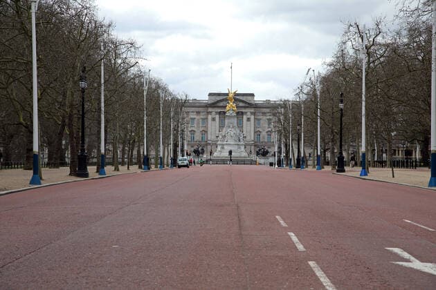 The Mall on a very quiet Friday as few people and tourists venture out. The COVID-19 Coronavirus pandemic crisis continues, and although there is no lockdown in London, some changes to public transport have been made as there seems to be fewer people and tourists moving around the city. COVID-19 Coronavirus crisis, London, UK on March 20, 2020 