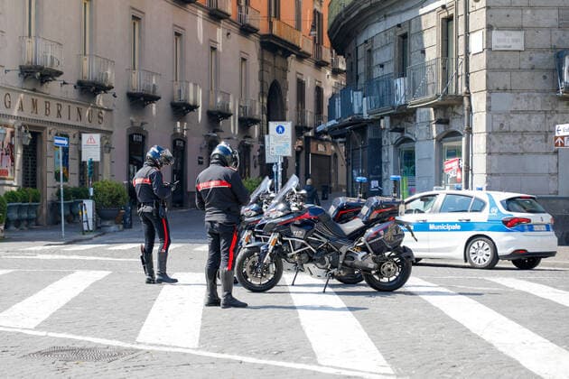 March 20, 2020, Naples, CAMPANIA, ITALY: Italy-20 03 2020 Naples, during the pandemic of the covid-19 virus, the streets are empty both in the center and in the suburbs but the inconvenience for citizens with garbage heaps begins, the lack of food for the less well-off. Now the military arrives, but the Neapolitans do not afflict themselves and respond with flags and banners from the balconies. Naples ITALY - ZUMAs236 20200320_zap_s236_017 Copyright: xFabioxSassox
