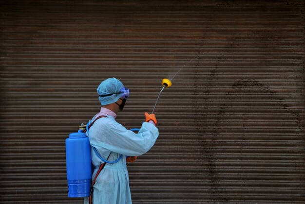 (200320) -- JAMMU, March 20, 2020 -- A health worker disinfects a closed market after authorities ordered the closure of all shops except pharmacies and grocery stores in Jammu, Indian-controlled Kashmir, March 20, 2020. (Str Xinhua) KASHMIR-JAMMU-COVID-19 Stringer 