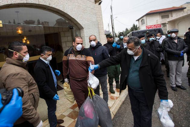 March 20, 2020, Beit Jala, West Bank: Recovered Palestinian released from quarantine at Angles Hotel, at end of the quarantine after 14 days. Beit Jala West Bank - ZUMAb133 20200320_zap_b133_013 Copyright: xMustafaxBaderx