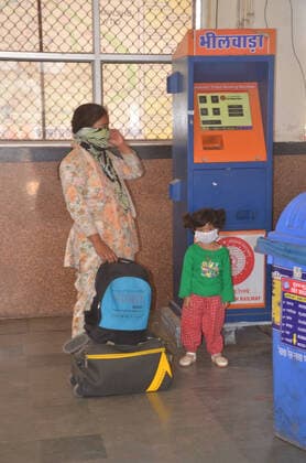India: Curfew after COVID-19 positive cases A passenger wearing face mask awaits bus at Roadways bus stand in Bhilwara. Rajasthan Government declared curfew in the city after six tested postive for COVID-19 to prevent further spread of the disease. Bhilwara Rajashan India Copyright: SumitxSaraswat