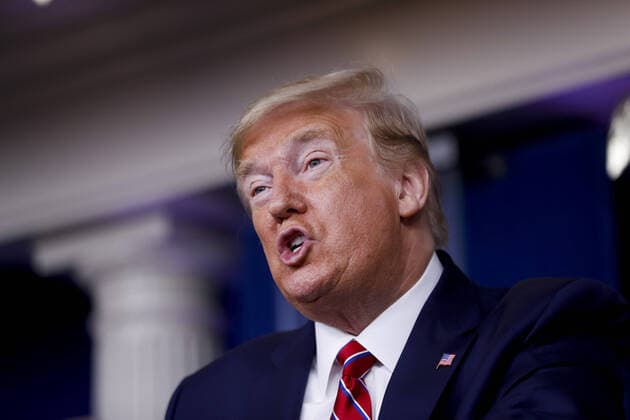 U.S. President Donald Trump speaks during a Coronavirus Task Force news conference in the briefing room of the White House in Washington, DC on Friday, March 20, 2020. Americans will have to practice social distancing for at least several more weeks to mitigate U.S. cases of Covid-19, Anthony S. Fauci of the National Institutes of Health said today.  WAX20200320206 ALxDRAGO