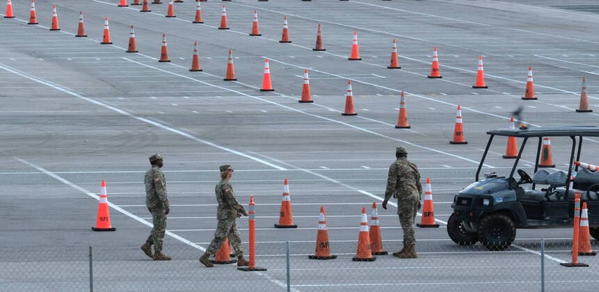 The Army Corps of Engineers set up a parking lot for Coronavirus testing and staging of the Florida National Guard at the Hard Rock Stadium on Friday, March 20, 2020 in Miami, Florida. This test site is scheduled to handle Miami area residents to help identify the Coronavirus Pandemic.  MIA20200320101 GARYxIxROTHSTEIN