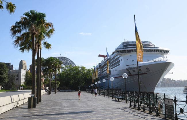 CORONAVIRUS AUSTRALIA, The Carnival Spirit cruise ship pictured in a very quiet Circular Quay, Sydney, Saturday, March 21, 2020. Sydney is seeing a dramatic reduction in people on the streets as people are asked to enact social distancing and self isolation in order to prevent the spread of Covid-19. ( NO ARCHIVING, EDITORIAL USE ONLY, NO USE IN BOOKS WITHOUT CONSENT SYDNEY NSW AUSTRALIA  Copyright: xJAMESxGOURLEYx 20200321001458535469
