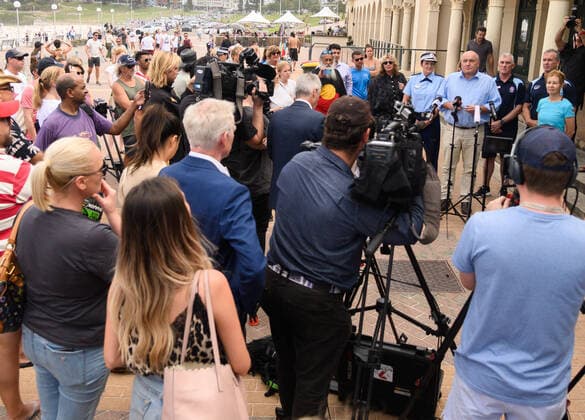 BONDI BEACH CORONAVIRUS CLOSURE, Minister for Police and Emergency Services David Elliott speaks during a press conference at Bondi Beach in Sydney, Saturday, March 21, 2020. Beachgoers drew condemnation yesterday when tens of thousands of people flouted social distancing rules, which have been put in place in an effort to limit the spread of COVID-19. ( NO ARCHIVING, EDITORIAL USE ONLY, NO USE IN BOOKS WITHOUT CONSENT SYDNEY NSW AUSTRALIA  Copyright: xJAMESxGOURLEYx 20200321001458564899