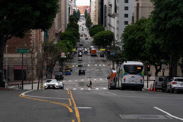 (200321) -- LOS ANGELES, March 21, 2020 -- Vehicles drive on a road in Los Angeles, California, the United States, March 20, 2020. California Governor Gavin Newsom announced Thursday evening a statewide stay-at-home order for the most populous U.S. state in response to the rapid spread of COVID-19. The governor s order went into effect immediately and is in place until further notice. (Photo by Xinhua) U.S.-CALIFORNIA-COVID-19-STAY-AT-HOME ORDER QianxWeizhong 