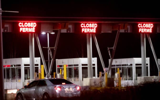 (200321) -- SURREY, March 21, 2020 (Xinhua) -- Closed border crossing counters are seen in Surrey, Canada, March 20, 2020. Canadian Prime Minister Justin Trudeau announced that the Canada-U.S. border will close to non-essential travel at midnight Friday and both countries will turn back asylum seekers crossing the border. (Photo by Andrew Soong Xinhua) CANADA-U.S.-COVID-19-BORDER CLOSE 