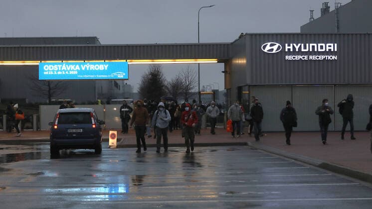 Employees of car-maker Hyundai leave Hyundai s plant in Nosovice, Czech Republic, after shutdown of the plant in relation to coronavirus outbreak, on March 21, 2020. (CTKxPhoto PetrxSznapka) CTKPhotoP202003210081901 SZN 02