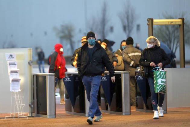 Employees of car-maker Hyundai leave Hyundai s plant in Nosovice, Czech Republic, after shutdown of the plant in relation to coronavirus outbreak, on March 21, 2020. (CTKxPhoto PetrxSznapka) CTKPhotoP202003210082201 SZN 06