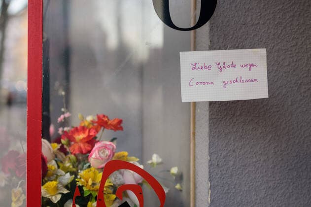 March 21, 2020: A handwritten note with the writing Dear guests closed because of Corona Liebe Gaeste wegen Corona geschlossen is hanging at a window of a sex cinema in the Berlin district of Schöneberg while the Governing Mayor of Berlin, Michael Mueller (SPD), prepares restricting residents movements to contain the deadly coronavirus pandemic. Public venues such as bars, clubs, museums, cinemas, schools, daycare centers and universities have already closed. Many businesses are resorting to home office work for their employees. And travel across the border to most neighbouring countries is severely restricted. - ZUMAs172 20200321_zap_s172_003 Copyright: xJanxScheunertx
