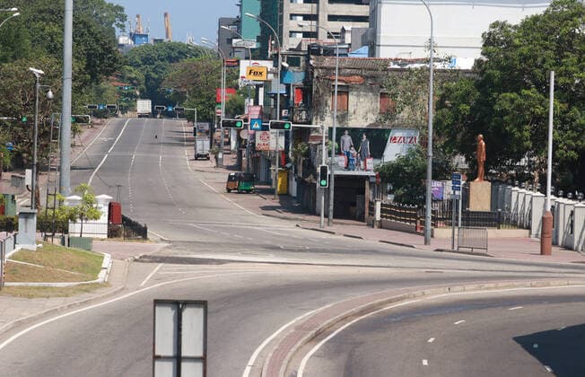 Sri Lanka: Empty street after curfew due to COVID-19 A view of an empty street is seen after the authorities announced a weekend curfew in the country as a preventive measure against the spread of the COVID-19 novel coronavirus, in Colombo March 21, 2020. Colombo Western Province Sri Lanka Copyright: SamanxAbesiriwardana