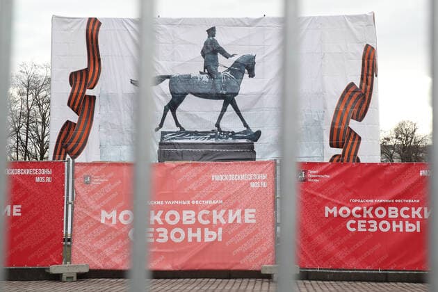 MOSCOW, RUSSIA - MARCH 20, 2020: An empty pedestal surrounded by hoarding is after a slightly altered temporary replica of an equestrian statue of Marshal of the Soviet Union Georgy Zhukov was dismantled, in front of Moscowâ€™s State Historical Museum in Manezhnaya Square in central Moscow . The replica had been installed on 19 March 2020. The original statue by Vyacheslav Klykov and Yuri Grigoryev is to be reinstated to its original place by 9 May 2020 after renovation. On 9 May 2020, Russia will celebrate the 75th anniversary of the Soviet victory over Nazi Germany in the 1941-1945 Great Patriotic War (part of WWII). Vyacheslav Prokofyev TASS  TS0D2FC5