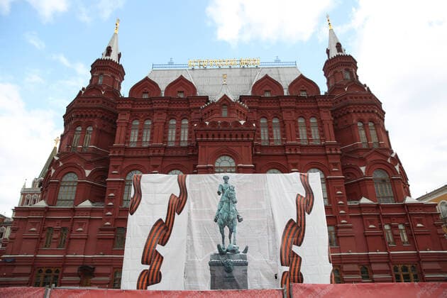 MOSCOW, RUSSIA - MARCH 20, 2020: An empty pedestal surrounded by hoarding is seen after a slightly altered temporary replica of an equestrian statue of Marshal of the Soviet Union Georgy Zhukov was dismantled, in front of Moscowâ€™s State Historical Museum in Manezhnaya Square in central Moscow . The replica had been installed on 19 March 2020. The original statue by Vyacheslav Klykov and Yuri Grigoryev is to be reinstated to its original place by 9 May 2020 after renovation. On 9 May 2020, Russia will celebrate the 75th anniversary of the Soviet victory over Nazi Germany in the 1941-1945 Great Patriotic War (part of WWII). Vyacheslav Prokofyev TASS  TS0D2FC8