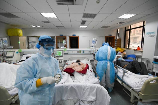 (200321) -- WUHAN, March 21, 2020 -- Medical workers work at the hemodialysis center of the nephrology department in Hankou Hospital of Wuhan, capital of central China s Hubei Province, March 21, 2020. Medics at the hemodialysis center of the nephrology department of Hankou Hospital have been sticking to their posts during the novel coronavirus epidemic outbreak. In addition to carrying out blood purification treatment for COVID-19 patients in critical conditions, they also conduct hemodialysis treatment for some 40 uremic patients recovering from COVID-19 infection every week. ) CHINA-HUBEI-WUHAN-MEDICS-HEMODIALYSIS (CN) ChenxYehua 