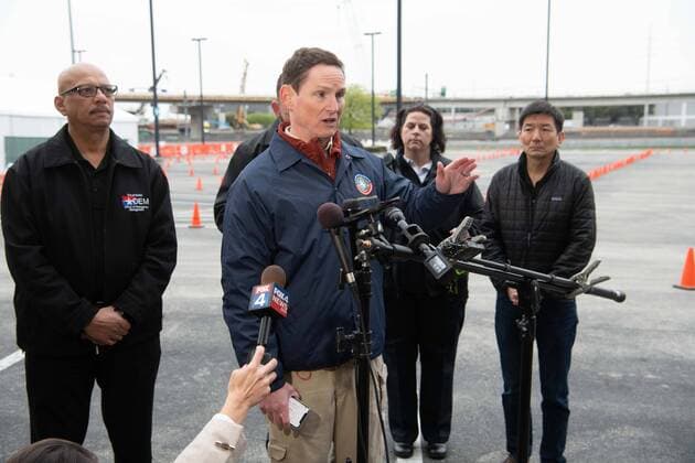 March 21, 2020, Dallas, Texas: Dallas County Judge Clay Jenkins speaks to the media at the opening of the first of two county-sponsored COVID19 testing center in the county...The testing centers will have enough kits to test nearly 5,000 persons per week. The federal government has promised to deliver testing kits at least once per week...People seeking tests do not have to be Dallas County residents. However, in order to be tested, individuals must have a fever of 99.6 degrees or above and be either 65 or older, a first responder, a health care worker or a Dallas Area Rapid Transit bus driver. Dallas - ZUMAa183 20200321_znp_a183_003 Copyright: xAvixAdelmanx
