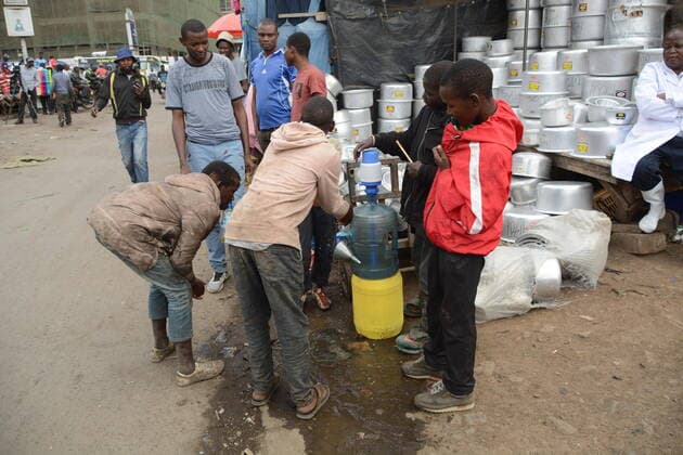 March 20, 2020, Nairobi, Kenya: Street children at Gikomba Market in Nairobi wash their hands with liquid soap as a preventive measure against covid-19..The Kenyan government has banned all public gatherings activities, rallies and crusades. Places of worship are allowed to hold prayers provided they have hand sanitizers. Kenya has so far reported only seven cases of coronavirus. Nairobi Kenya - ZUMAs197 20200320_zaa_s197_267 Copyright: xDennisxSigwex