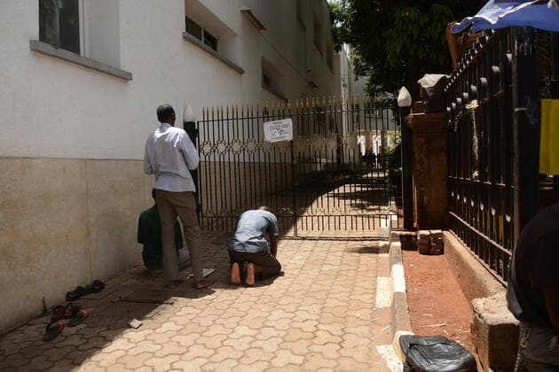 March 21, 2020, Nairobi, Kenya: Muslims pray outside Jamia Mosque in Nairobi following its temporary closure due to covid-19..The Kenyan government has banned all public gatherings activities, rallies and crusades. Places of worship are allowed to hold prayers provided they have hand sanitizers. Kenya has so far reported only seven cases of coronavirus. Nairobi Kenya - ZUMAs197 20200321_zaa_s197_082 Copyright: xDennisxSigwex