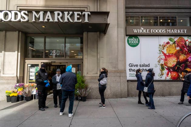 New York during the COVID-19 pandemic Line of customers outside of Whole Foods Market in Chelsea in New York as the store limits the amount of shoppers inside because of the COVID-19 pandemic, seen on Saturday, March 21, 2020. (  RichardxB.xLevine