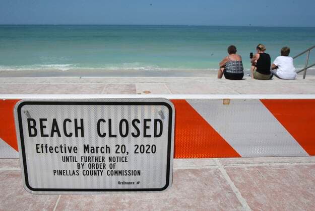 March 21, 2020, Pass-A-Grille, Florida, USA: A look at the mostly empty beach with the beach closed sign and burricade near the steps leading down to the sand on Saturday, March 21, 2020 at Pass-a-Grille. Pinellas County beaches are now closed. Pinellas County announced that all public beaches closed starting onSaturday. Pass-A-Grille USA - ZUMAs70_ 20200321_zan_s70_007 Copyright: xDirkxShaddx