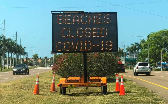 March 21, 2020, Pass-A-Grille, Florida, USA: An electronic sign reads Beach Closed Covid-19 after the tolls heading out to the beach on Saturday, March 21, 2020 at St. Pete Beach. Pinellas County beaches are now closed. Pinellas County announced that all public beaches closed starting onSaturday. Pass-A-Grille USA - ZUMAs70_ 20200321_zan_s70_012 Copyright: xDirkxShaddx