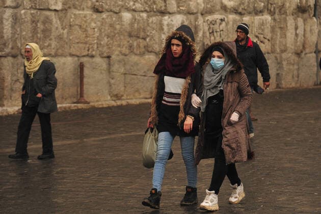 March 21, 2020, Damascus, Damascus, Syrian Arab Republic: Syrians wearing masks as a means of protection against the coronavirus COVID-19 in Damascus, Syria, on March 21, 2020. Even though no cases of coronavirus Covid-19 have yet been reported in the city, some people prefer to take precautionary measures Damascus Syrian Arab Republic - ZUMAap3_ 20200321_zaf_ap3_064 Copyright: xOmarxEstwanix
