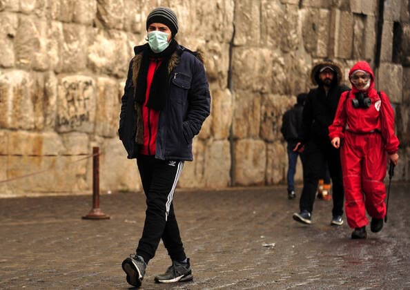 March 21, 2020, Damascus, Damascus, Syrian Arab Republic: A Syrian wearing a mask as a means of protection against the coronavirus COVID-19 in Damascus, Syria, on March 21, 2020. Even though no cases of coronavirus Covid-19 have yet been reported in the city, some people prefer to take precautionary measures Damascus Syrian Arab Republic - ZUMAap3_ 20200321_zaf_ap3_079 Copyright: xOmarxEstwanix