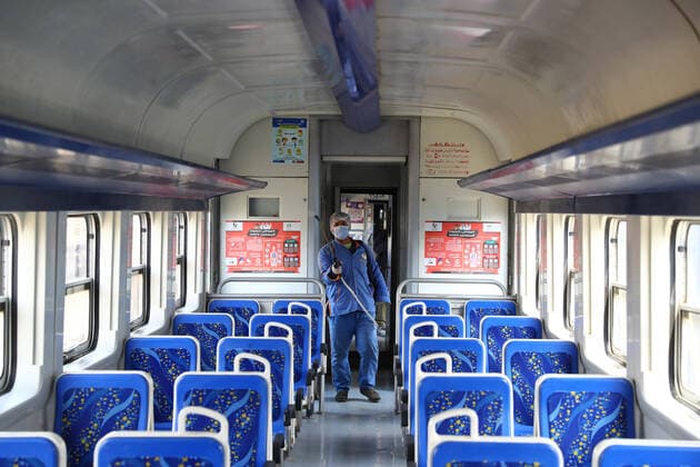 (200321) -- CAIRO, March 21, 2020 (Xinhua) -- A man sprays disinfectant in a train at Ramses railway station in Cairo, Egypt, on March 21, 2020. Egypt announced on Saturday two more deaths from COVID-19 and nine new cases of infection, bringing the total number of confirmed cases to 294 in the country. (Photo by Ahmed Gomaa Xinhua) EGYPT-CAIRO-COVID-19-MEASURES 