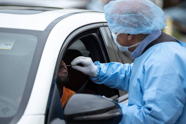March 21, 2020, San Mateo, California, USA: Dr. JOSE GILBERTO MONTOYA, a viral immunologist and expert in various diseases and how they spread, taking samples for coronavirus testing. San Mateo USA  - ZUMA 20200321_mda_h167_001 Copyright: xChrisxHardyx