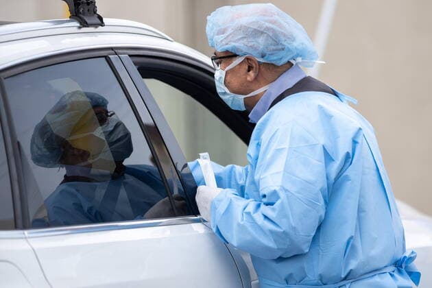 March 21, 2020, San Mateo, California, USA: Dr. JOSE GILBERTO MONTOYA, a viral immunologist and expert in various diseases and how they spread, taking samples for coronavirus testing. San Mateo USA  - ZUMA 20200321_mda_h167_006 Copyright: xChrisxHardyx