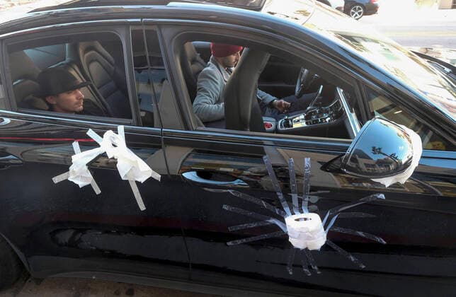 March 21, 2020, Los Angeles, California, U.S: A Porsche is decorated with toilet papers is seen on Hollywood Boulevard on Saturday, March 21, 2020, in Los Angeles. California Gov. Gavin Newsom issued a statewide stay-at-home order Thursday for residents to venture outside only for essential jobs, errands and some exercise, due to coronavirus concerns. Los Angeles U.S. - ZUMAc68_ 20200321_zaf_c68_018 Copyright: xRingoxChiux