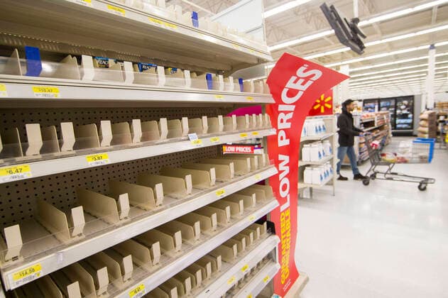 (200322) -- TORONTO, March 22, 2020 -- Empty shelves are seen at a Walmart pharmacy in Toronto, Canada, March 21, 2020. With shortages of many items like face masks, surgical gowns, protective eye-wear and hand sanitizers, Canada s Ontario Provincial Premier Doug Ford appealed to the province s manufacturing sector to help produce key medical supplies on Saturday. (Photo by Xinhua) CANADA-TORONTO-COVID-19-MEDICAL SUPPLIES-SHORTAGE ZouxZheng 