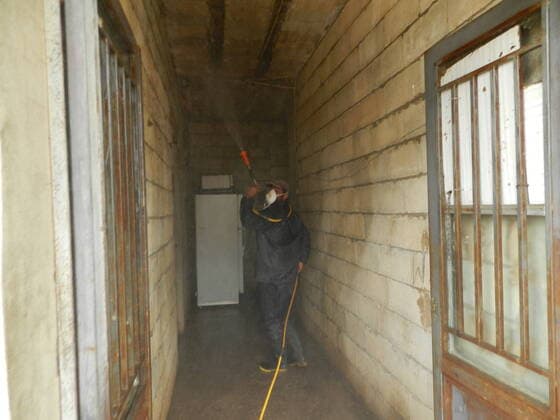 (200322) -- BEIRUT, March 22, 2020 (Xinhua) -- A man disinfects a house belonging to a Syrian refugee family in southern Lebanon on March 21, 2020. Syrian refugee camps and houses in southern Lebanon were disinfected Saturday by local authorities. Lebanon s number of COVID-19 cases increased on Saturday to 206, the National News Agency reported, quoting the health ministry. (Photo by Taher Xinhua) LEBANON-BEIRUT-REFUGEE CAMPS-DISINFECTION 