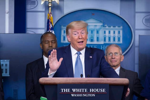 United States President Donald J. Trump, joined by members of the Coronavirus Task Force, makes remarks on the Coronavirus crisis in the Brady Press Briefing Room of the White House in Washington, DC on Saturday, March 21, 2020. At left is United States Secretary of Housing and Urban Development (HUD) Ben Carson; and at right is Director of the National Institute of Allergy and Infectious Diseases at the National Institutes of Health Dr. Anthony Fauci. Copyright: xStefanixReynoldsx