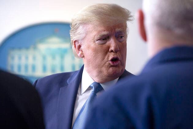 United States President Donald J. Trump motions to Director of the National Institute of Allergy and Infectious Diseases at the National Institutes of Health Dr. Anthony Fauci, not pictured, during a news conference on the Coronavirus crisis in the Brady Press Briefing Room of the White House in Washington, DC on Saturday, March 21, 2020. Copyright: xStefanixReynoldsx